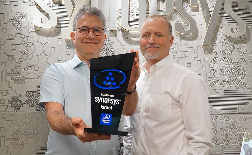 John Koeter and Ehud Loewenstein (Israel Sales Director) with Habana Labs' Thank you Trophy